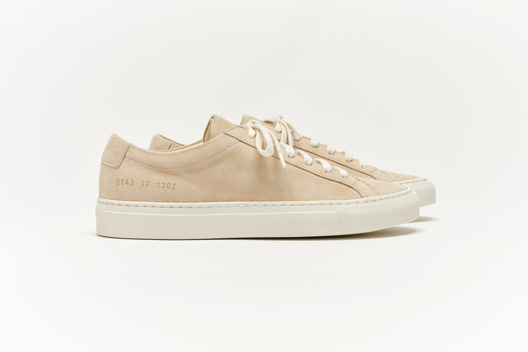 woman by common projects slip on